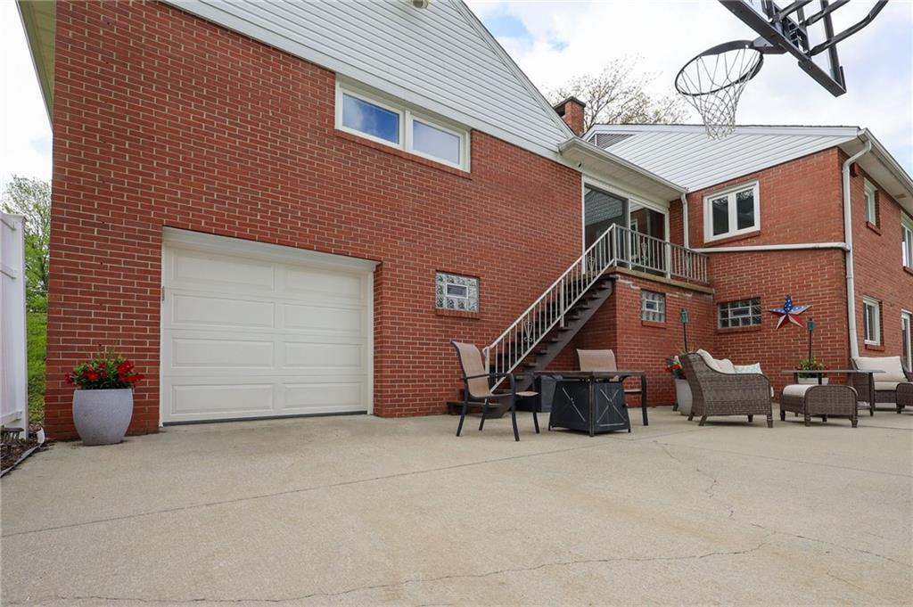 3689 Ridgewood Drive Hermitage, PA 16148 - Photo 40 of 49 a backyard of a house with seating space
