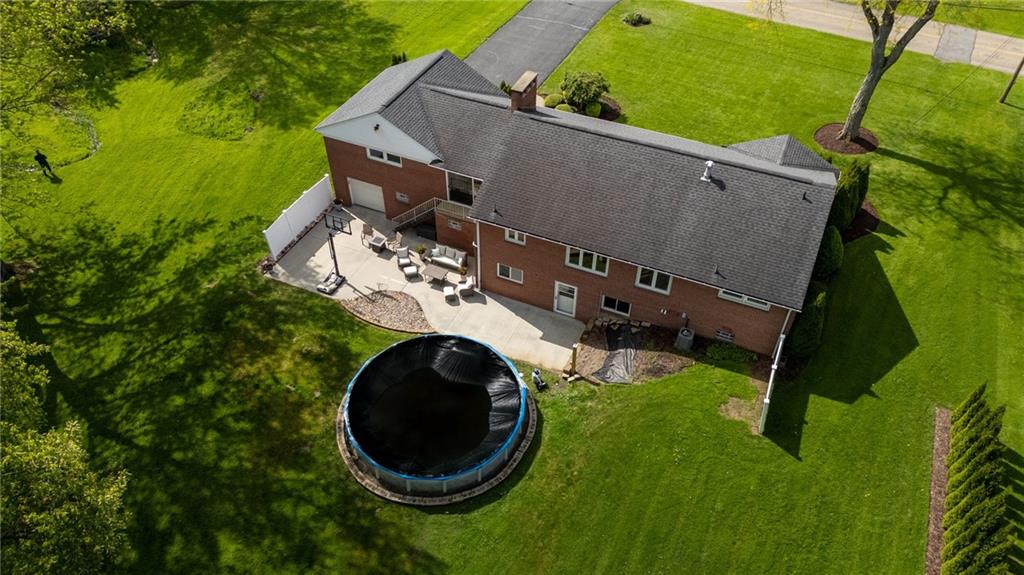 3689 Ridgewood Drive Hermitage, PA 16148 - Photo 43 of 49 an aerial view of a house with swimming pool and garden