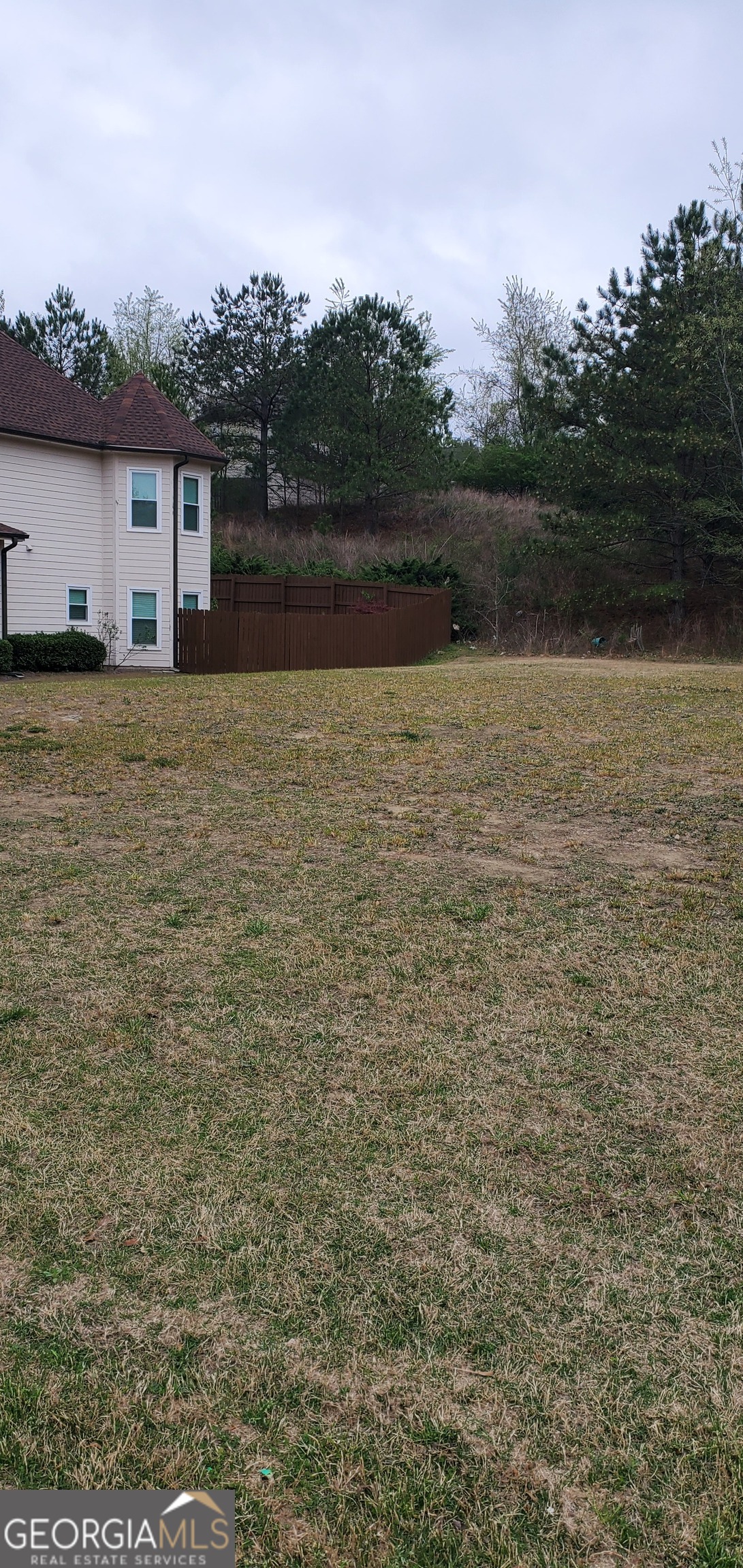 a view of house with outdoor space