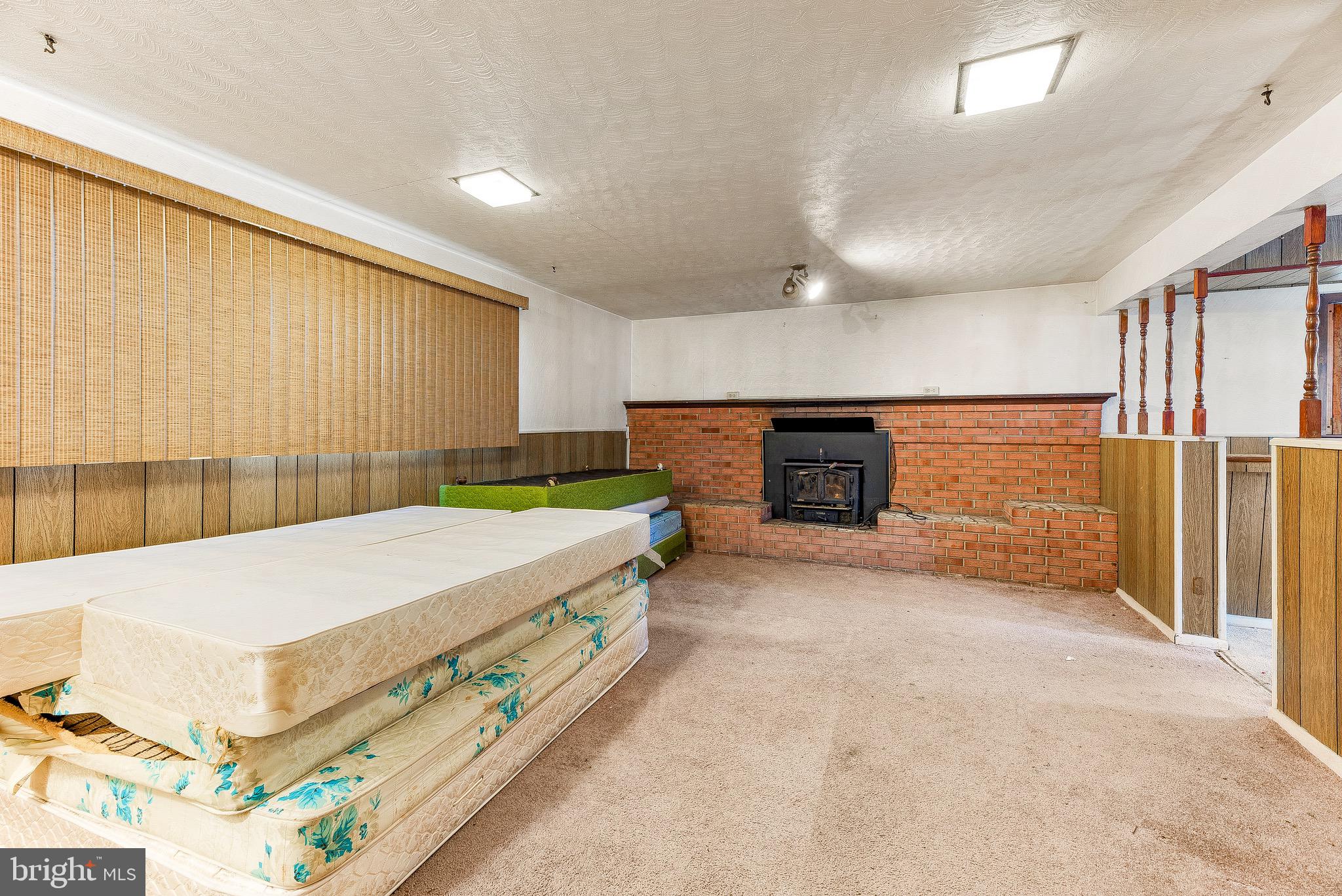 13606 Livingston Road Clinton, MD 20735 - Photo 24 of 33 Lower level family room w/fire place