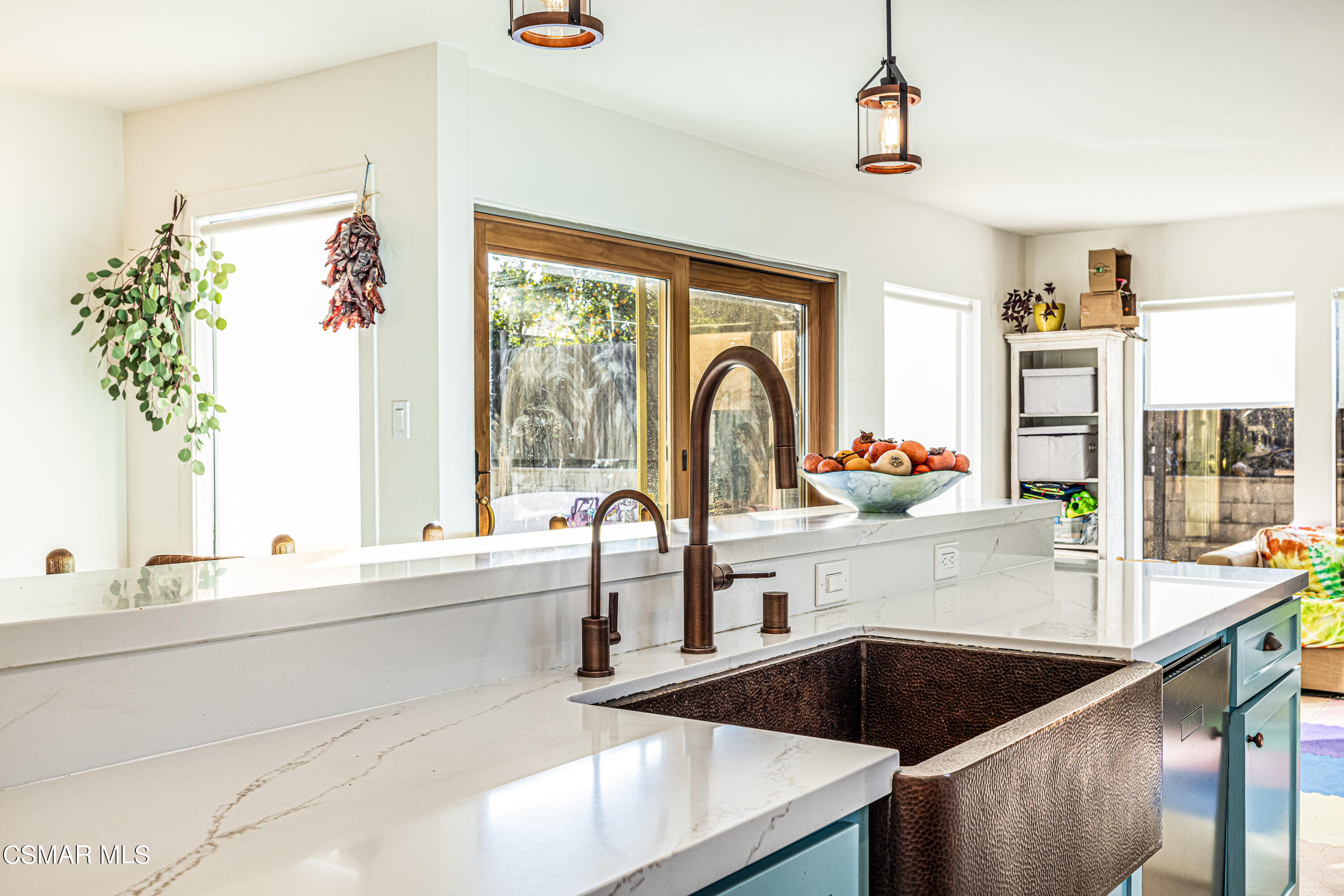 1405 Meadowbrook Road Ojai, CA 93023 - Photo 11 of 25 a kitchen with a refrigerator a sink and cabinets