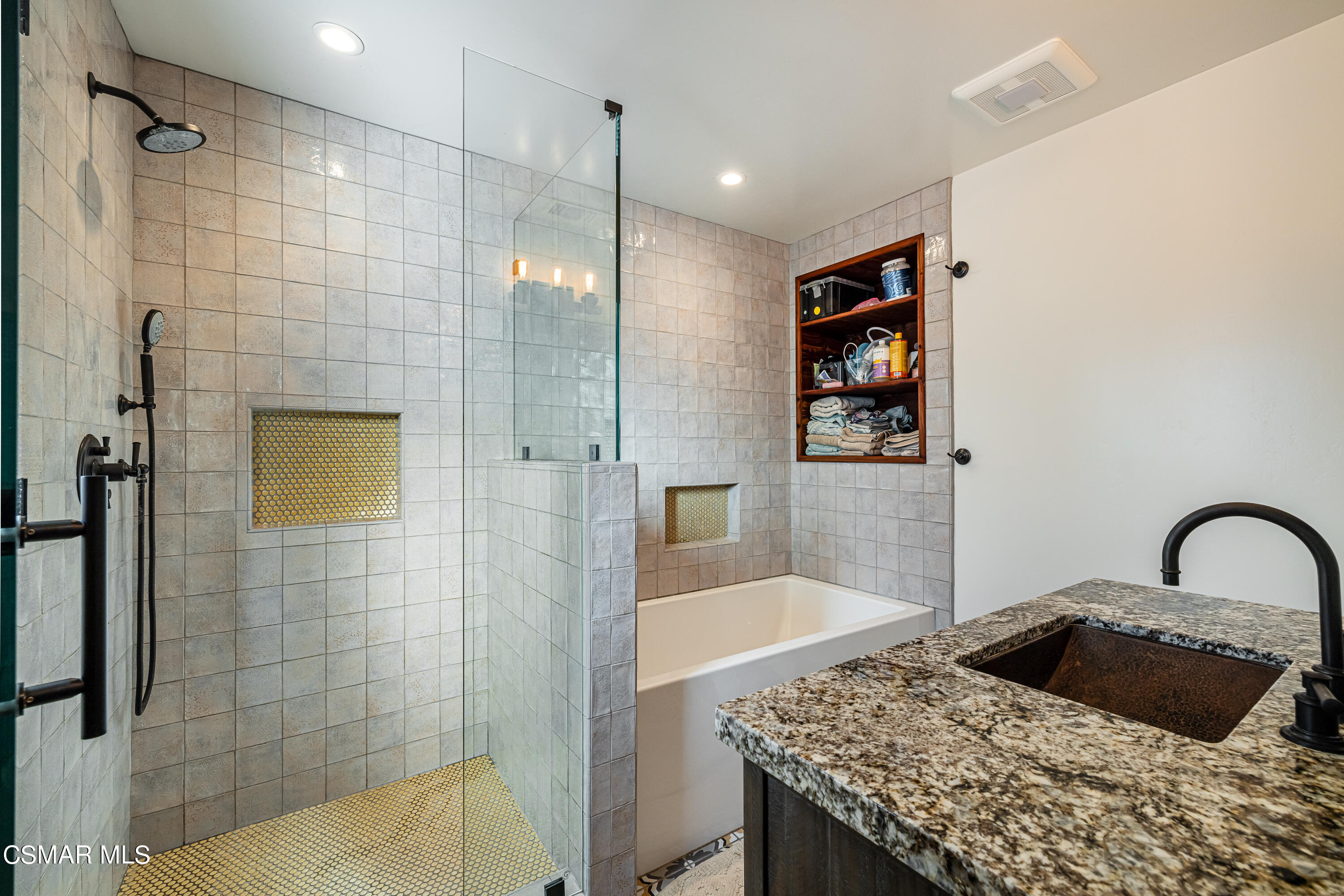 1405 Meadowbrook Road Ojai, CA 93023 - Photo 16 of 25 a bathroom with a granite countertop sink a shower and a bathtub