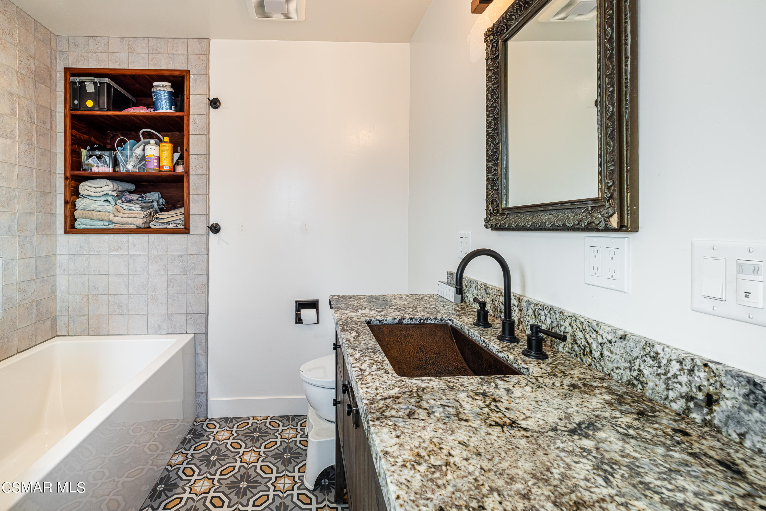 1405 Meadowbrook Road Ojai, CA 93023 - Photo 17 of 25 a bathroom with a bathtub and a sink