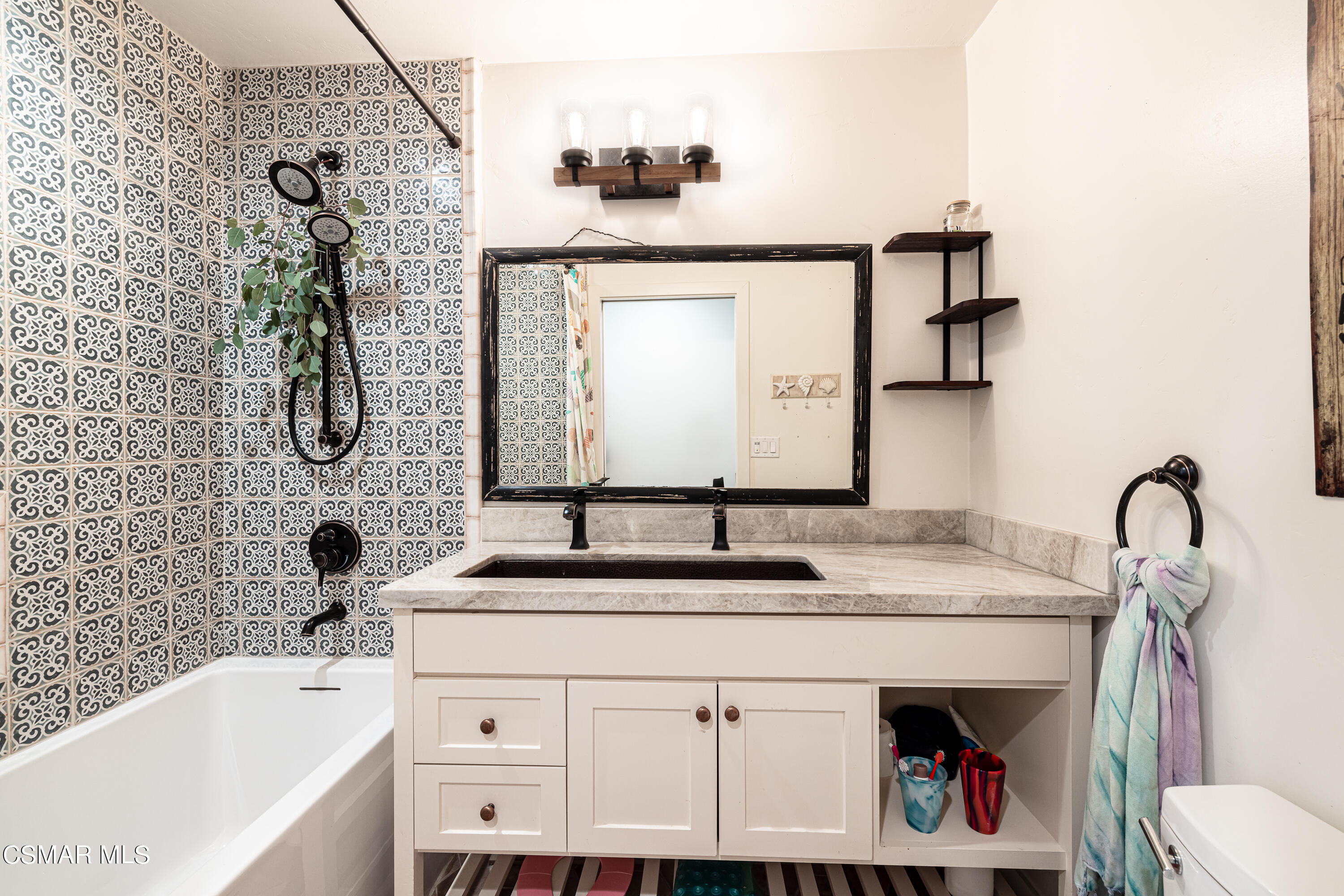 1405 Meadowbrook Road Ojai, CA 93023 - Photo 20 of 25 a bathroom with a sink and a mirror