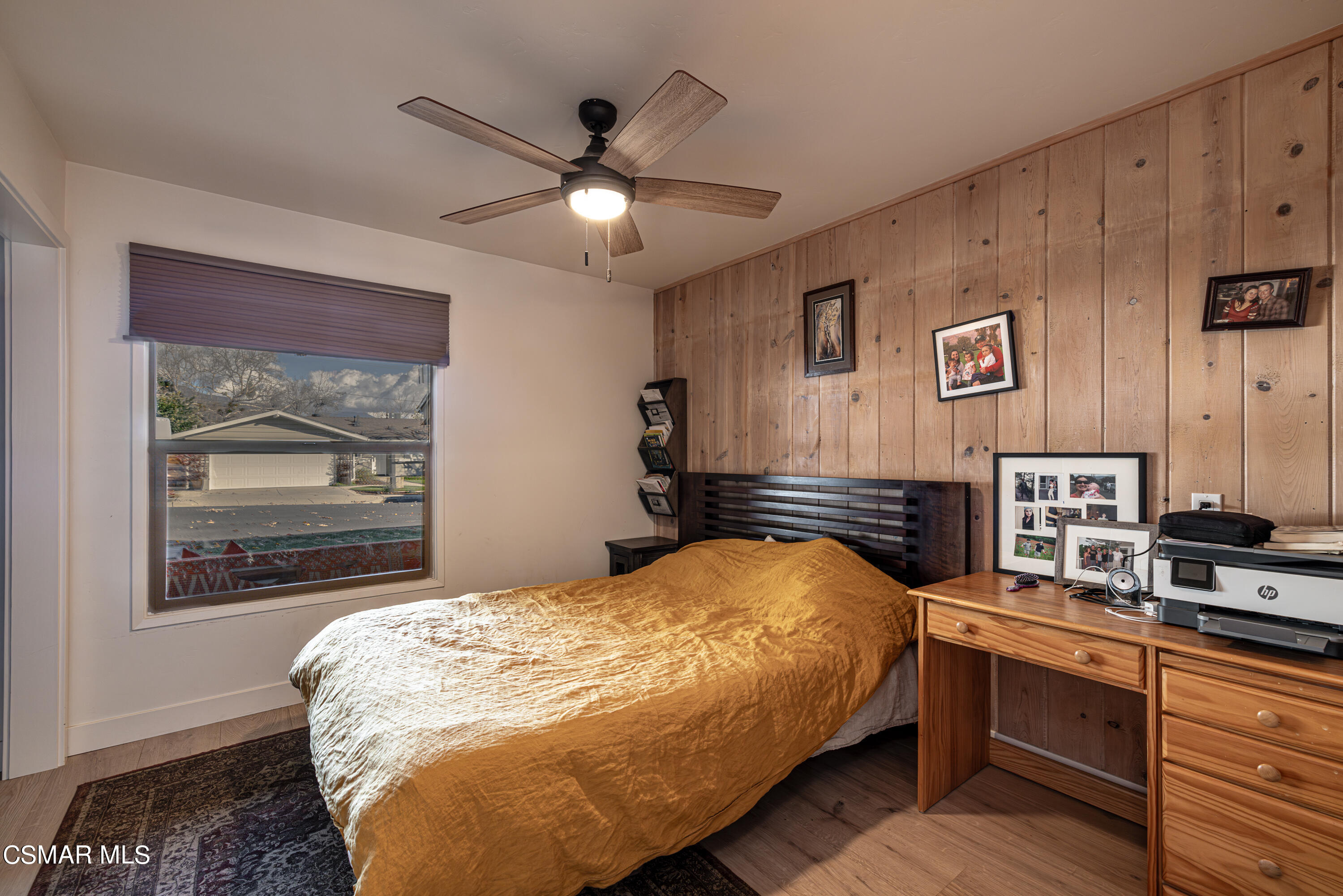 1405 Meadowbrook Road Ojai, CA 93023 - Photo 21 of 25 a bedroom with a bed and dresser with wooden floor