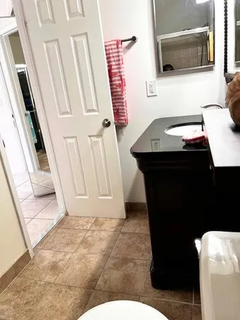 a view of a bathroom with a door