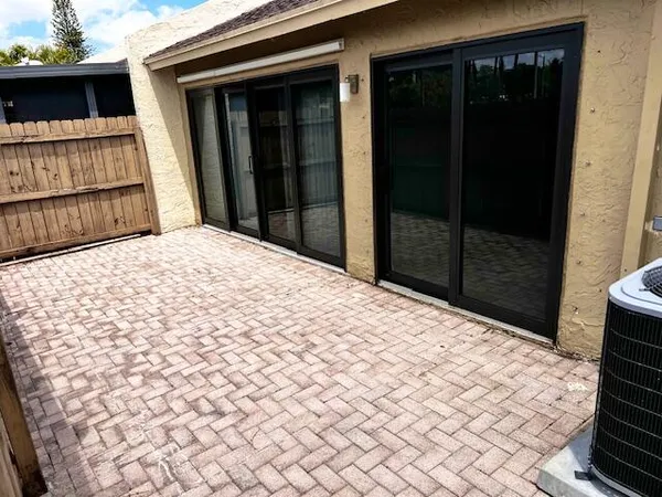 a bedroom with a bed and a stove