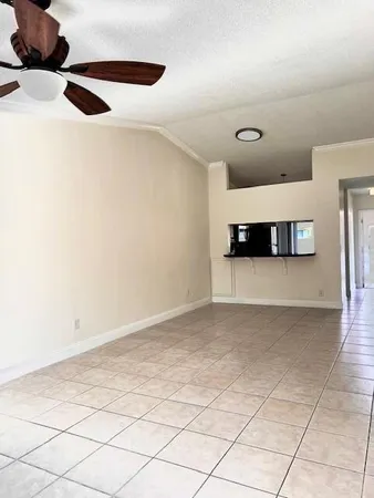a view of a living room with a wooden floor