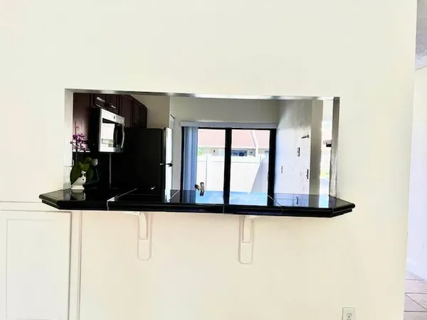 a view of living room with a fireplace