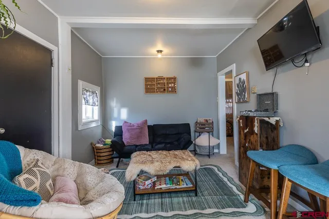 a front view of a house with many windows