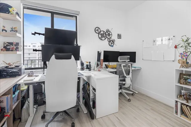 a view of a kitchen with appliances and cabinets