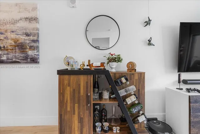 a front view of a room with gym equipment
