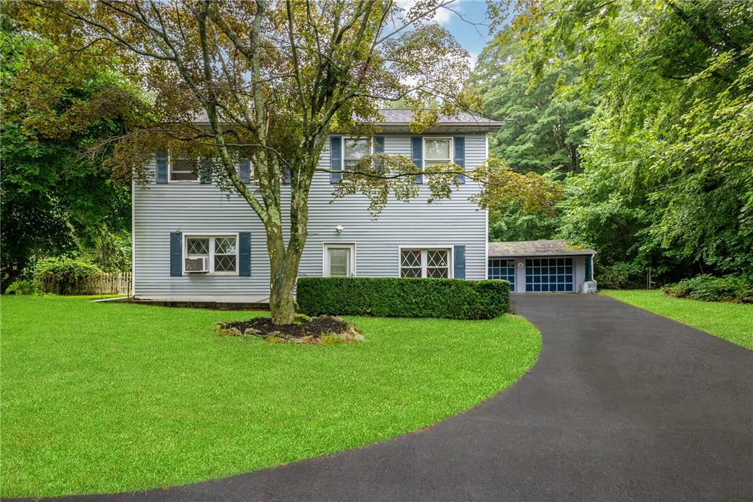 898 Chestnut Ridge Road Spring Valley, NY 10977 - Photo 1 of 1 Colonial-style house with a front yard