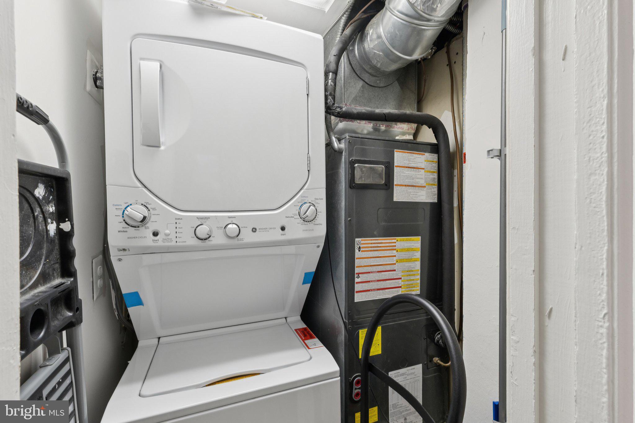 1858 California Street Northwest, Unit 5 Washington, DC 20009 - Photo 24 of 28 Efficient laundry nook in cozy space.