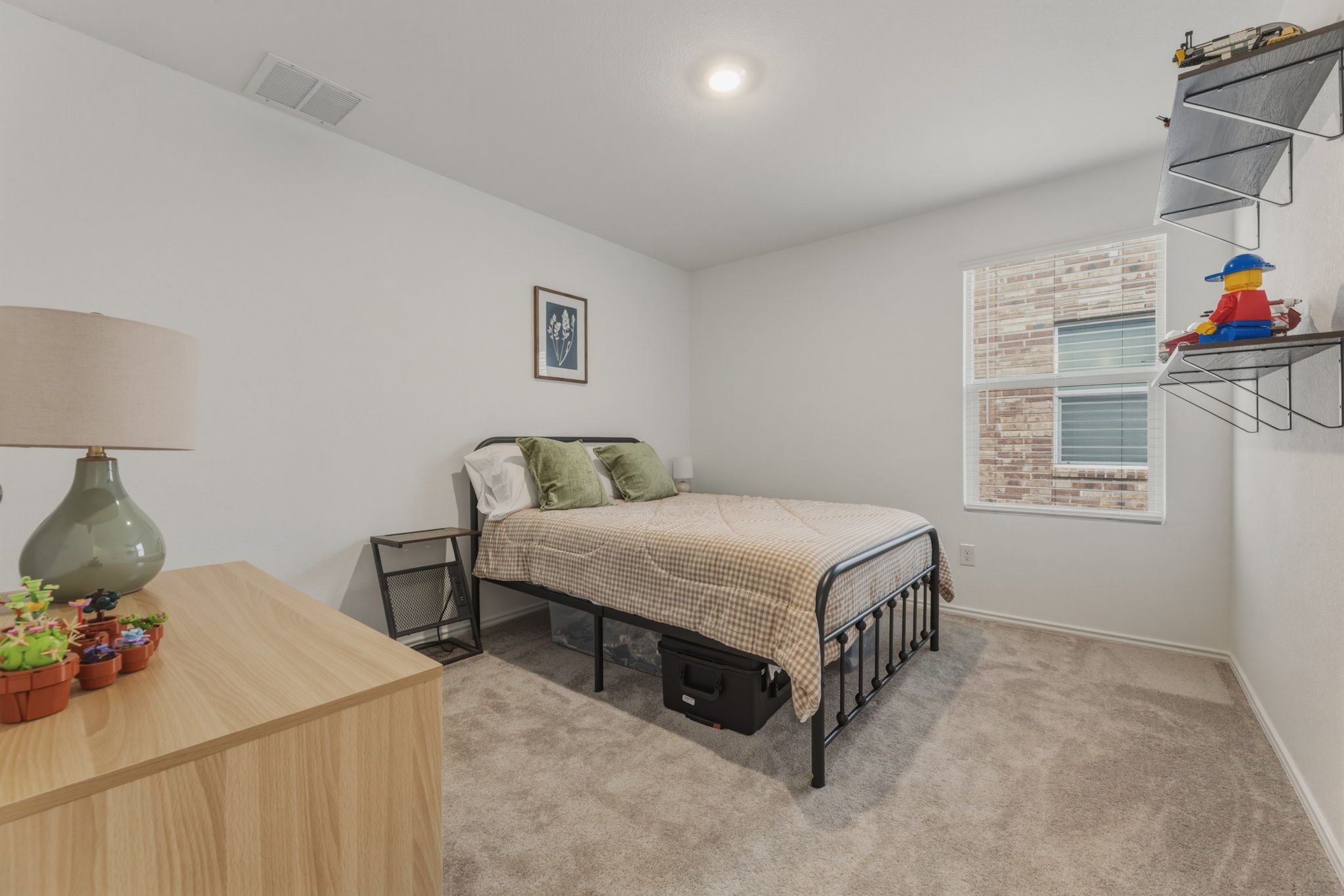 185 Sormonne Loop Kyle, TX 78640 - Photo 29 of 40 a bedroom with a bed and closet