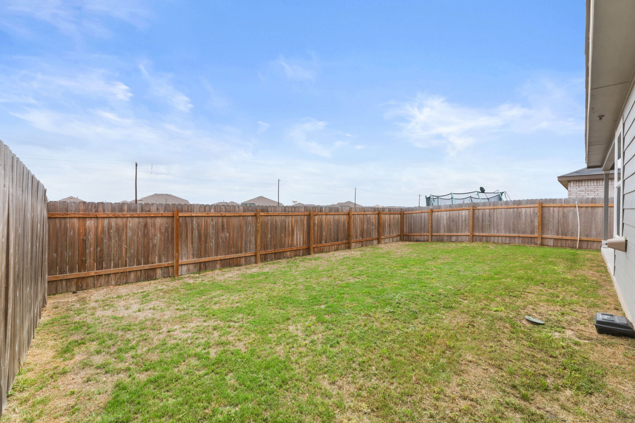 185 Sormonne Loop Kyle, TX 78640 - Photo 39 of 40 a view of a backyard