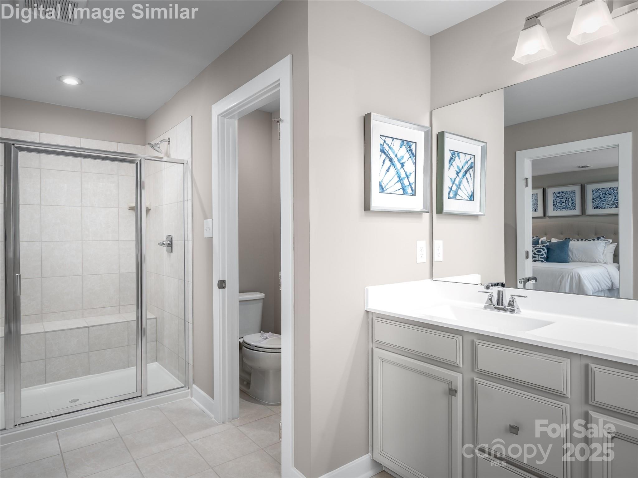 7538 West Berkeley Road Denver, NC 28037 - Photo 11 of 33 a bathroom with a shower sink and toilet