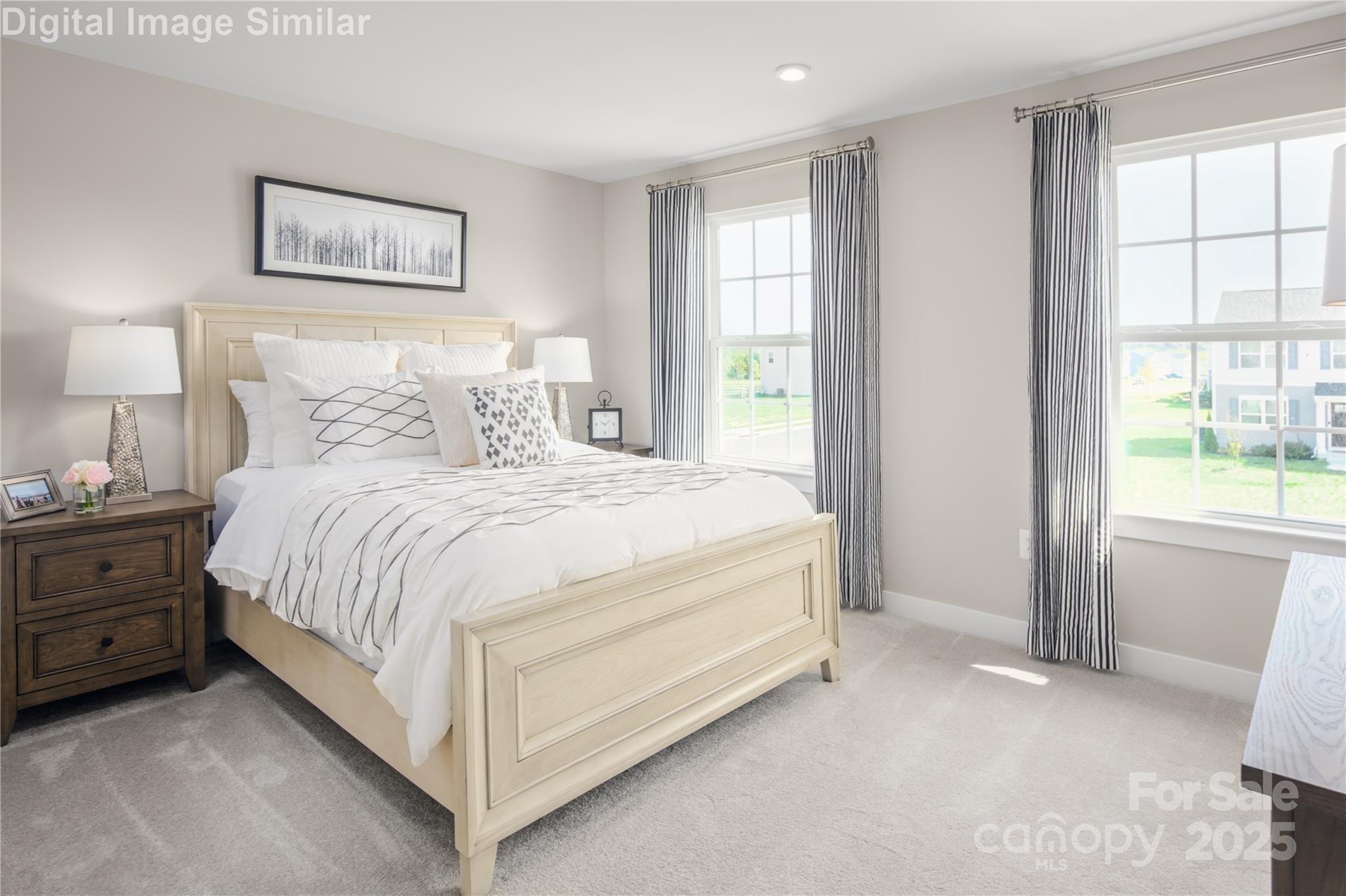 7538 West Berkeley Road Denver, NC 28037 - Photo 15 of 33 a spacious bedroom with a bed and a window