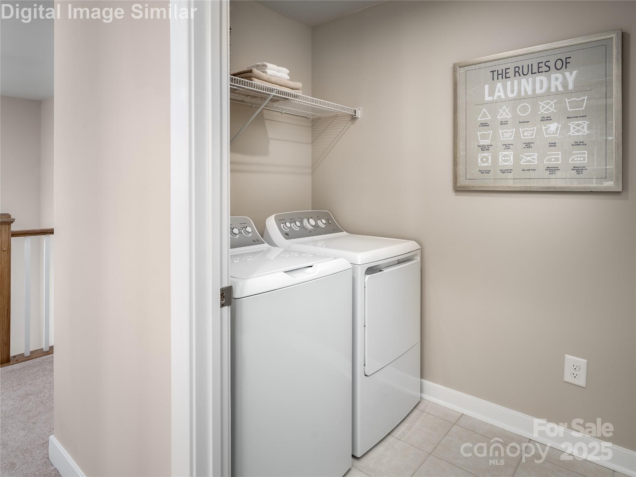 7538 West Berkeley Road Denver, NC 28037 - Photo 19 of 33 a utility room with dryer and washer