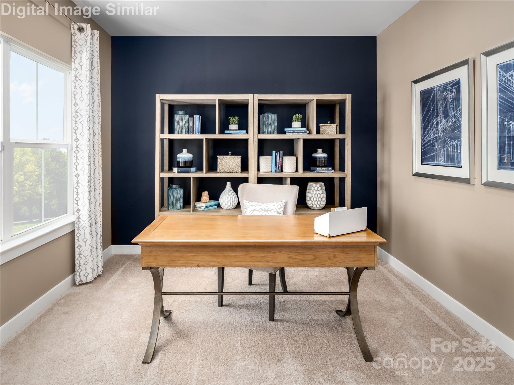 7538 West Berkeley Road Denver, NC 28037 - Photo 7 of 33 a view of a workspace with furniture and a window