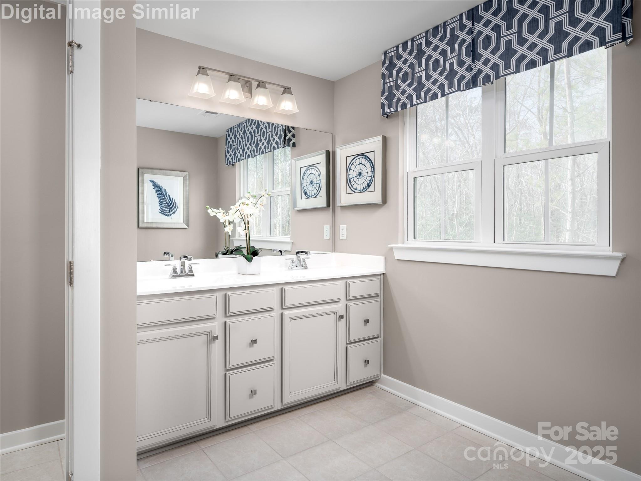 7538 West Berkeley Road Denver, NC 28037 - Photo 10 of 33 a spacious bathroom with a double vanity sink mirror and window