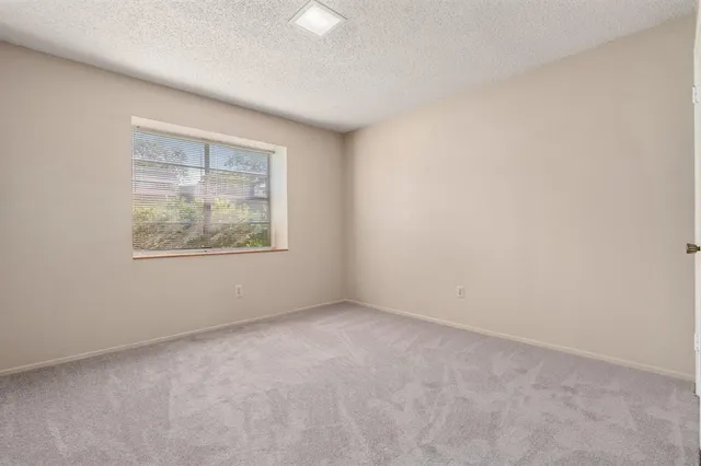 a bathroom with a tub and shower