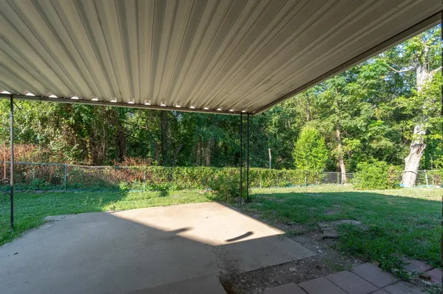 a view of a backyard with green space