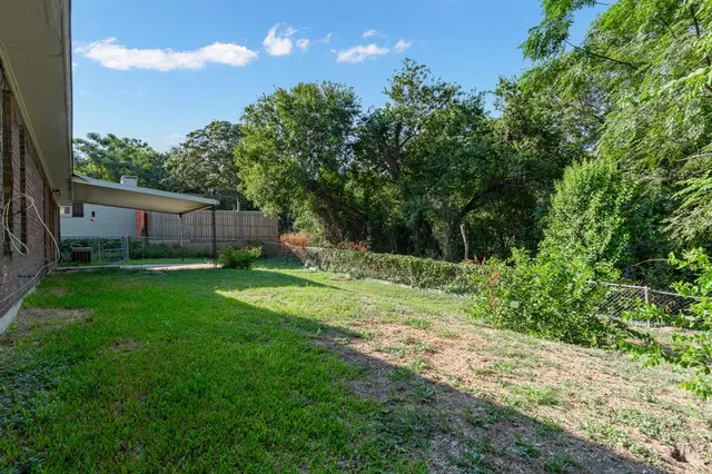 a house view with a garden space