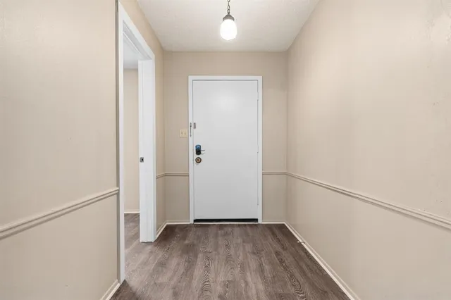 a view of small space with wooden floor