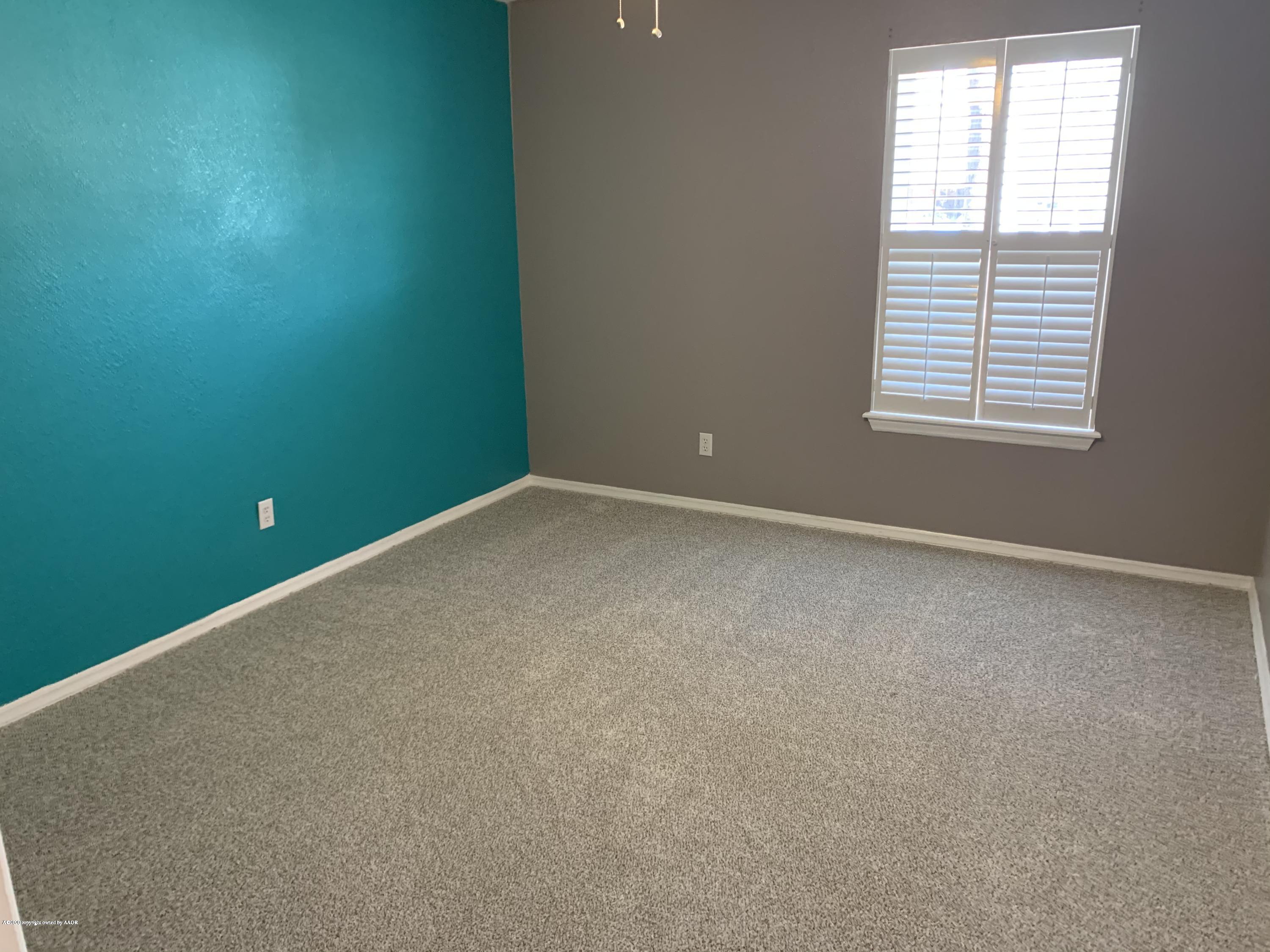 6905 Dreyfuss Road Amarillo, TX 79106 - Photo 15 of 19 an empty room with windows