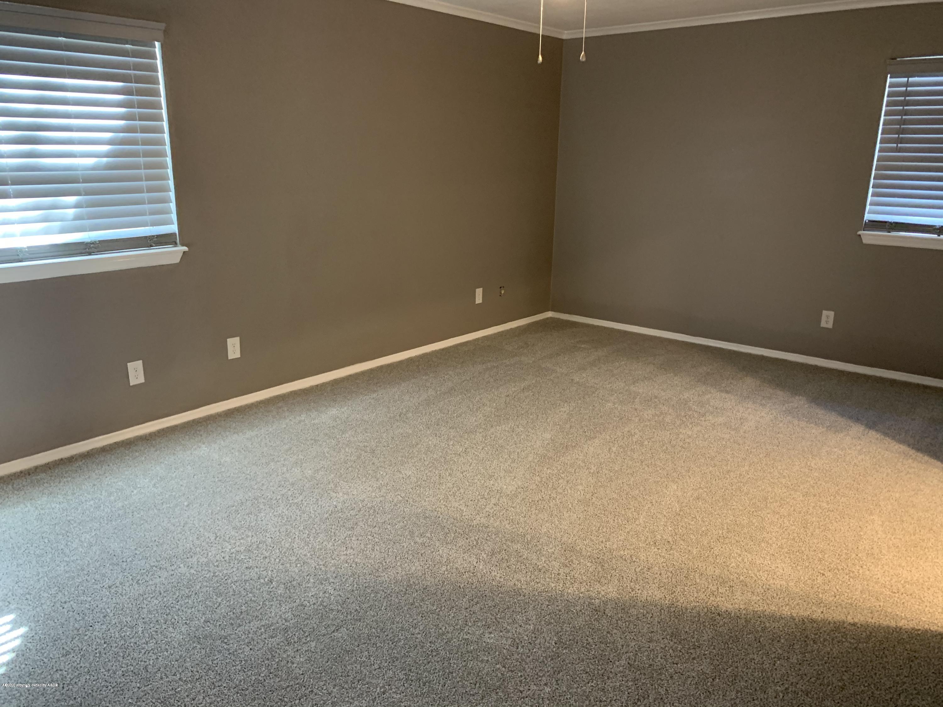 6905 Dreyfuss Road Amarillo, TX 79106 - Photo 10 of 19 a view of an empty room with a window