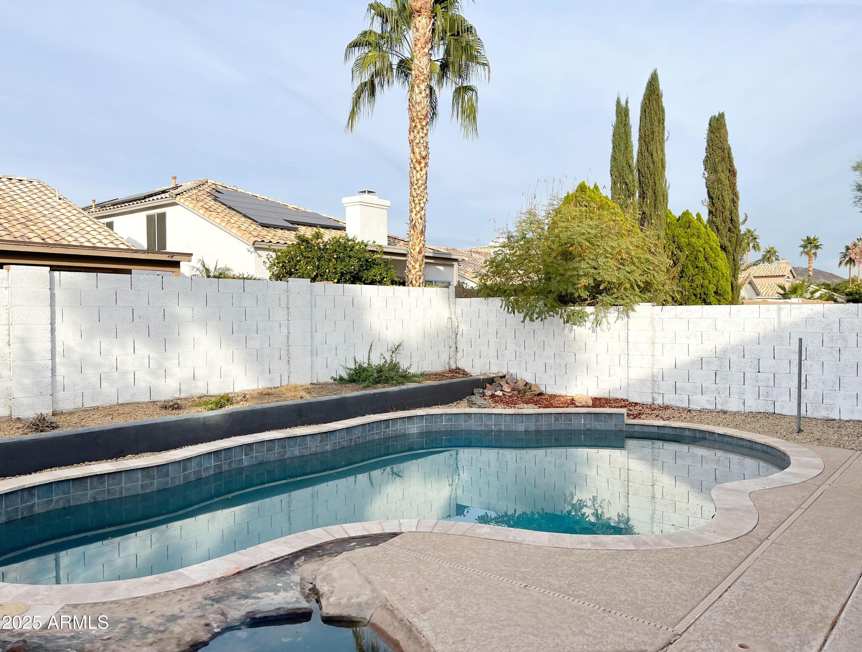 6926 West Via Del Sol Drive Glendale, AZ 85310 - Photo 17 of 18 a view of outdoor space and swimming pool