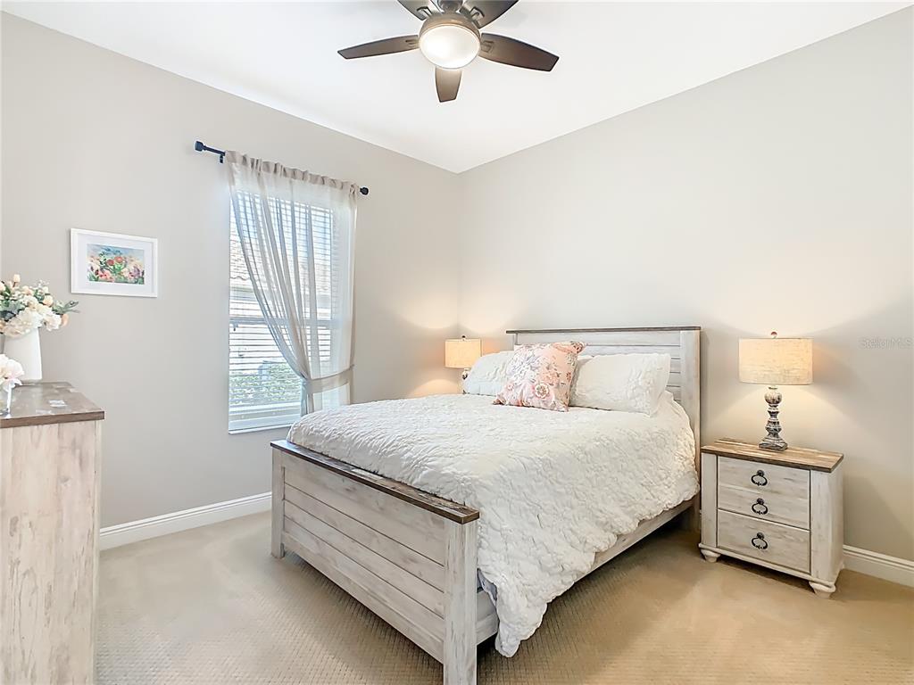 915 San Raphael Street Poinciana, FL 34759 - Photo 41 of 84 a bedroom with a bed and window