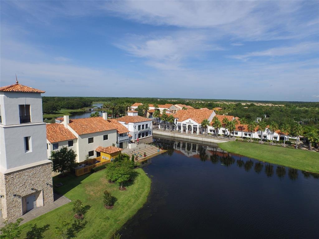 915 San Raphael Street Poinciana, FL 34759 - Photo 83 of 84 an aerial view of a city with lots of residential buildings ocean and mountain view in back