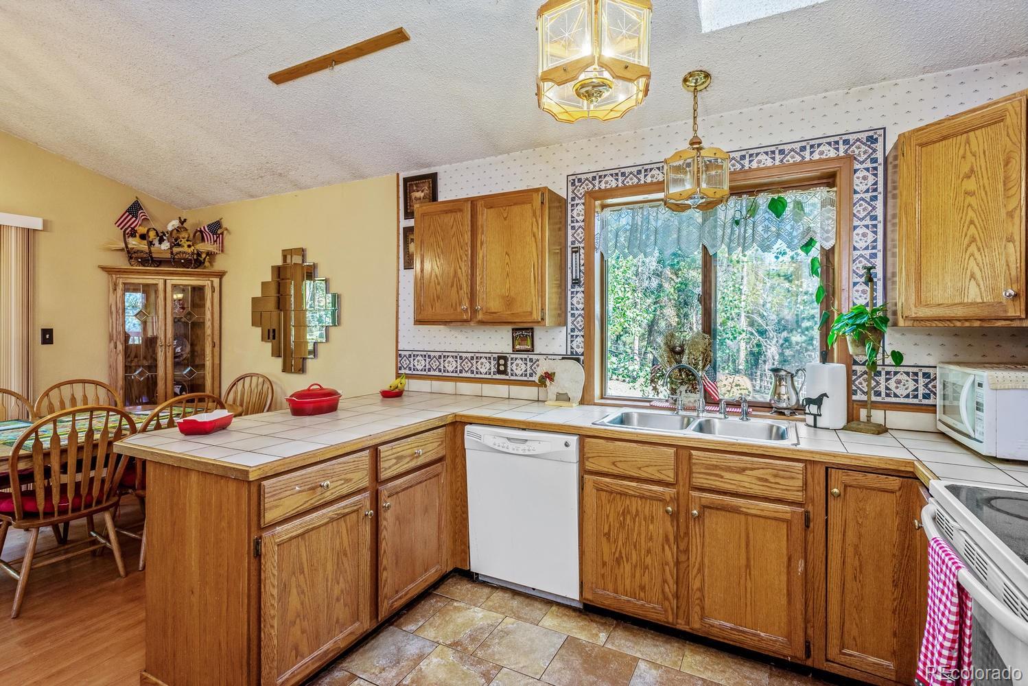 11055 Cordingly Road Conifer, CO 80433 - Photo 7 of 28 Gallery Image 7