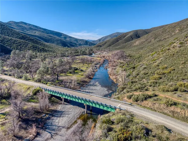 a view of a yard with a mountain