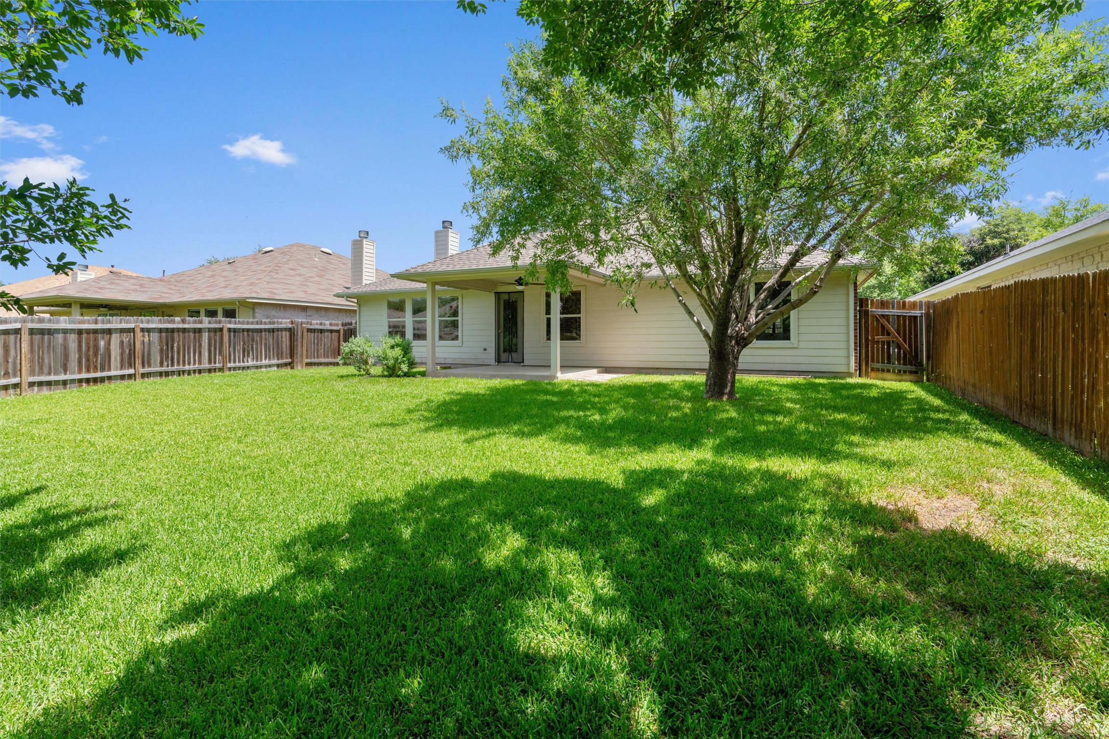 122 Copperwood Loop Round Rock, TX 78665 - Photo 24 of 40 There's a perfect mix of sun and shade in this backyard.