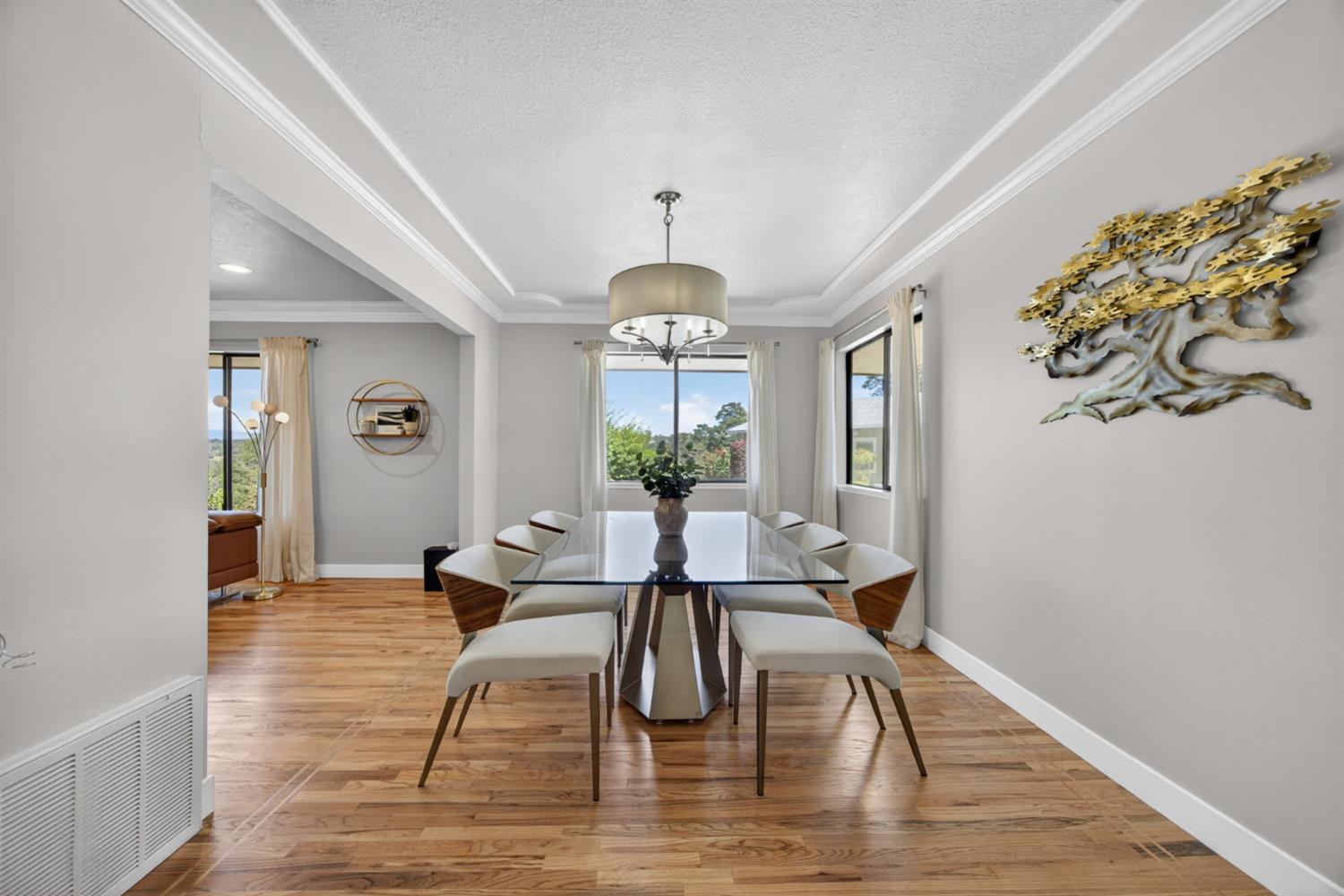 5560 Ralston Way Placerville, CA 95667 - Photo 13 of 78 Formal Dining area featuring crown molding, and a contemporary chandelier