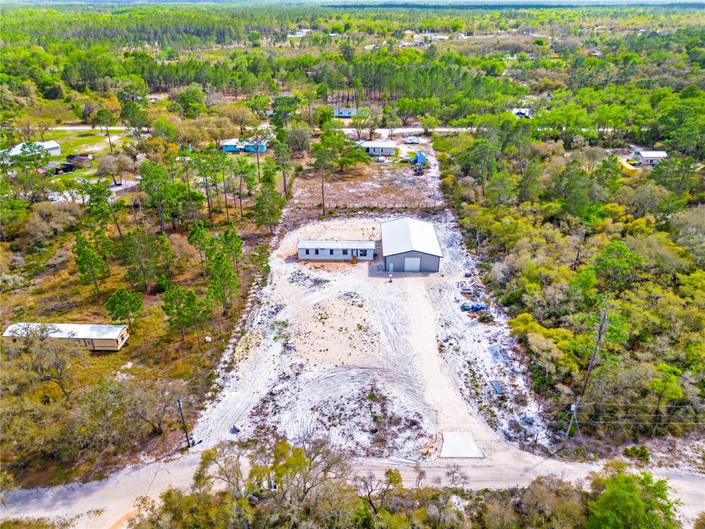 8342 Southwest 152nd Place Dunnellon, FL 34432 - Photo 11 of 96 a view of a pathway with a yard