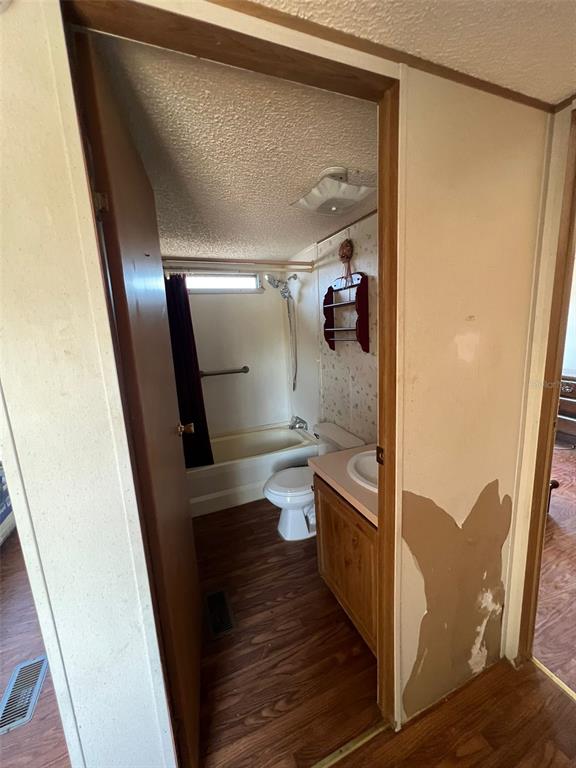 8342 Southwest 152nd Place Dunnellon, FL 34432 - Photo 30 of 96 a bathroom with a toilet and a shower
