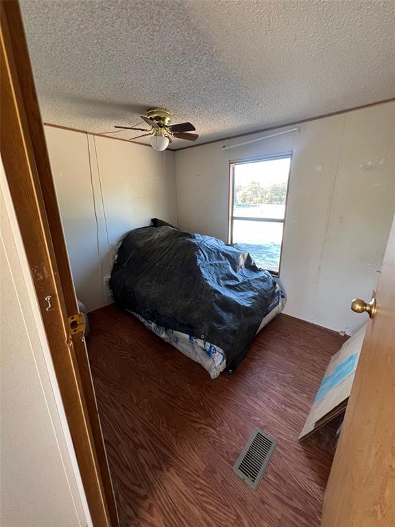 8342 Southwest 152nd Place Dunnellon, FL 34432 - Photo 45 of 96 a bedroom with a bed and a window
