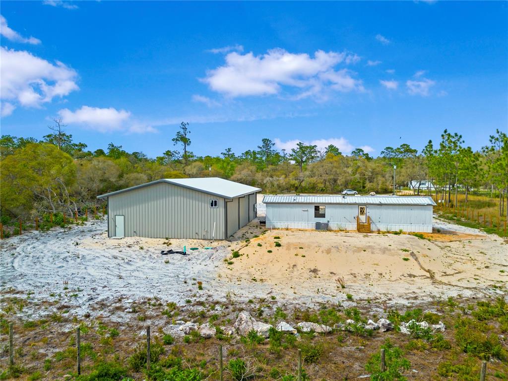 8342 Southwest 152nd Place Dunnellon, FL 34432 - Photo 5 of 96 a view of back yard of the house