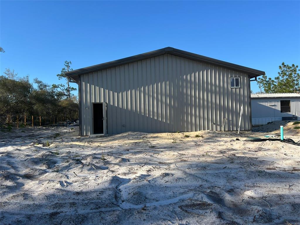 8342 Southwest 152nd Place Dunnellon, FL 34432 - Photo 52 of 96 a backyard of a house