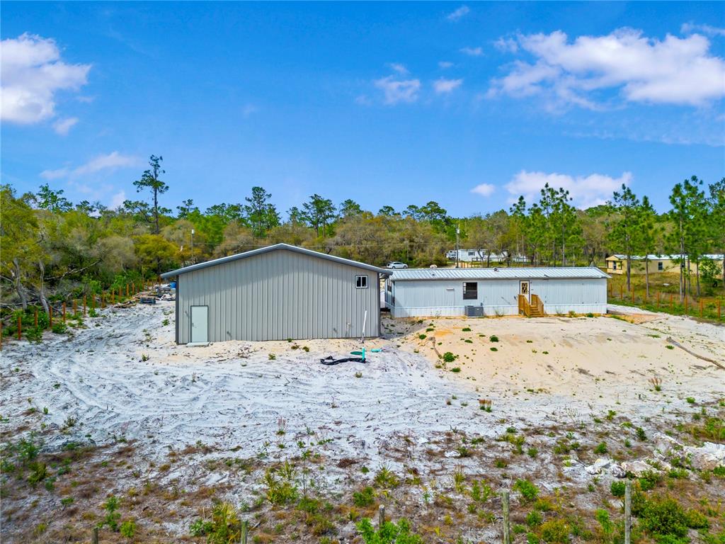 8342 Southwest 152nd Place Dunnellon, FL 34432 - Photo 6 of 96 a view of house with a yard