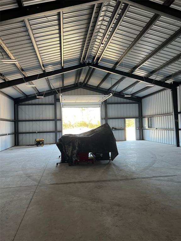 8342 Southwest 152nd Place Dunnellon, FL 34432 - Photo 65 of 96 a car parked in a garage