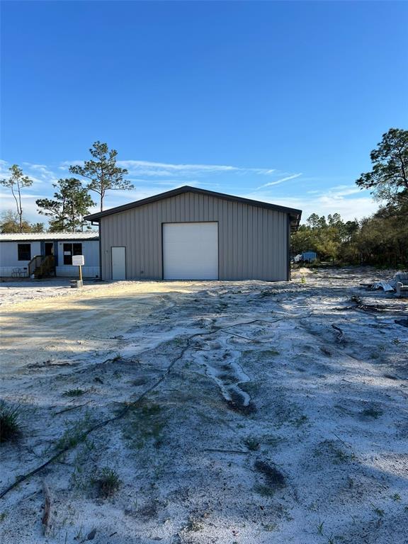 8342 Southwest 152nd Place Dunnellon, FL 34432 - Photo 78 of 96 a view of a swimming pool with an outdoor space
