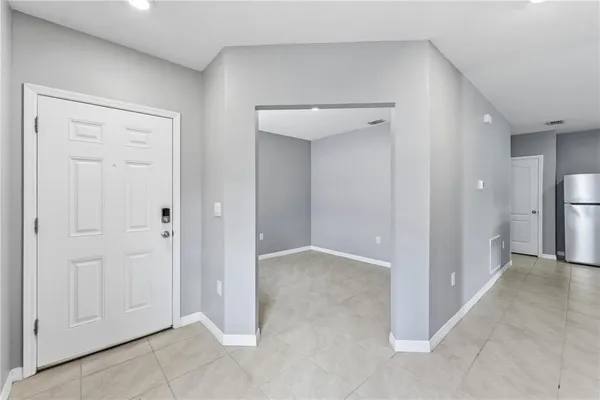 a view of entryway with white walls