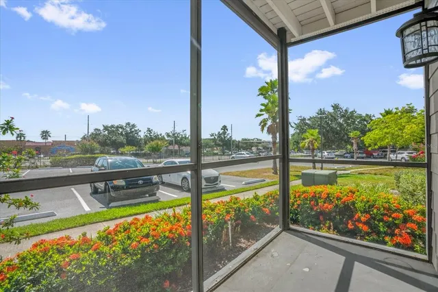 a view of swimming pool from a balcony