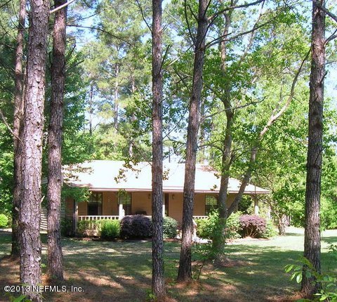 376732 Kings Ferry Road Hilliard, FL 32046 - Photo 18 of 19 Front View through trees