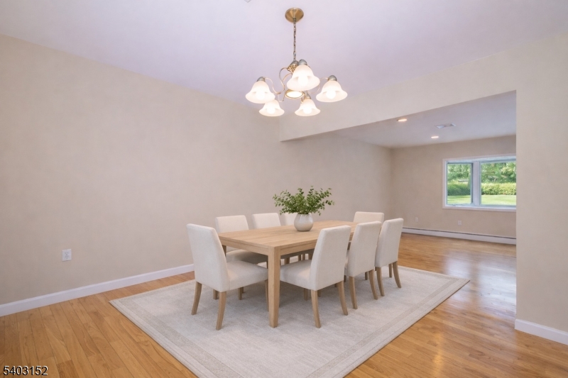 2 Robert Street Flanders, NJ 07836 - Photo 11 of 38 a view of a dining room with furniture and wooden floor